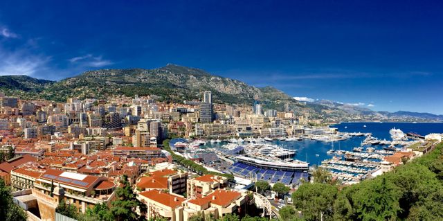 Panoramic View of Bustling Monaco Harbor with Mountain Backdrop - Download Free Stock Photos Pikwizard.com