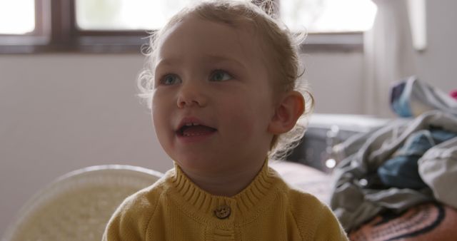 Joyful Toddler Laughing Inside Cozy Room - Download Free Stock Images Pikwizard.com