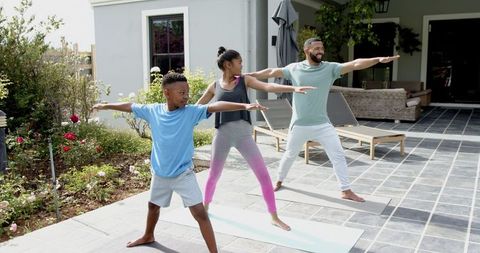Family Yoga Practice Outdoors Promoting Healthy Lifestyle