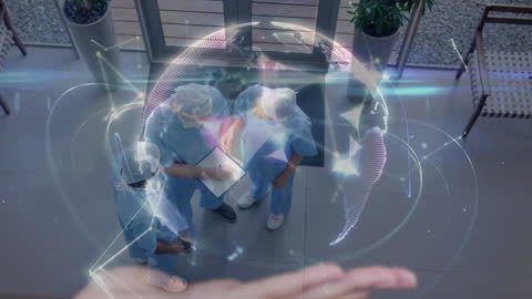 Surgeons Consulting with Holographic Interface