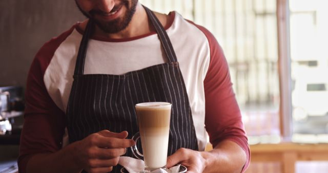 Smiling Barista Serving Freshly Made Latte - Download Free Stock Images Pikwizard.com