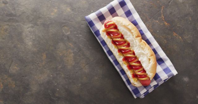 Hot Dog with Ketchup and Mustard on Blue Checkered Napkin - Download Free Stock Images Pikwizard.com