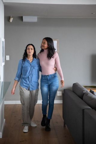 Diverse Female Friends Enjoying Casual Home Walk