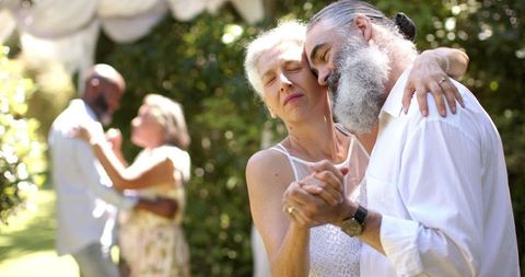 Elderly couple celebrating love in joyous wedding dance