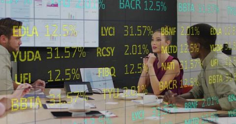 Business professional presenting financial analytics in boardroom meeting