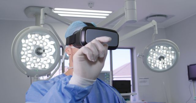 Doctor Using Virtual Reality Glasses in Operating Room - Download Free Stock Images Pikwizard.com