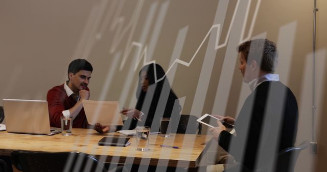 Business Team Analyzing Data at Work Desk in Modern Office - Download Free Stock Images Pikwizard.com