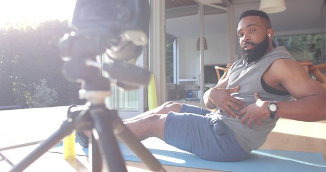 Fitness Instructor Recording Home Workout Routine on Tripod Camera - Download Free Stock Images Pikwizard.com