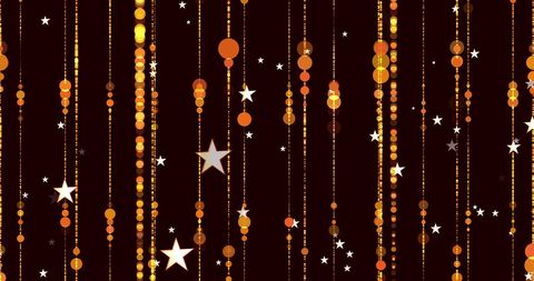Golden stars and light trails on dark background