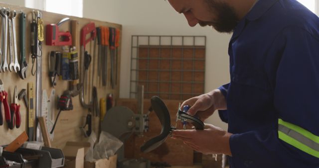 Male Carpenter Working in Home Workshop - Download Free Stock Images Pikwizard.com