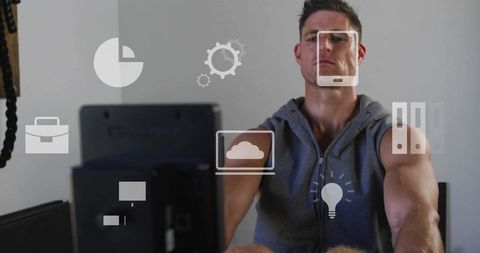 Focused man rowing on indoor ergometer with fitness UI overlay and training icons