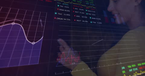 Woman Interacting with Financial Data Interface in Business Setting