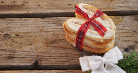 Heart-Shaped Festive Cookies Tied with Red Plaid Bow