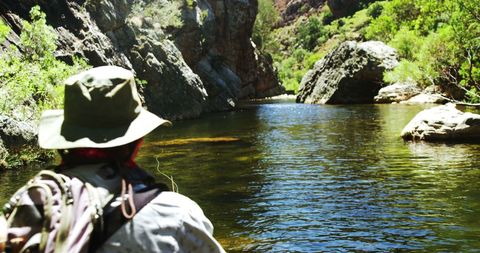 Fisherman Engaging in Peaceful Fly Fishing on Sunny River - Download Free Stock Images Pikwizard.com