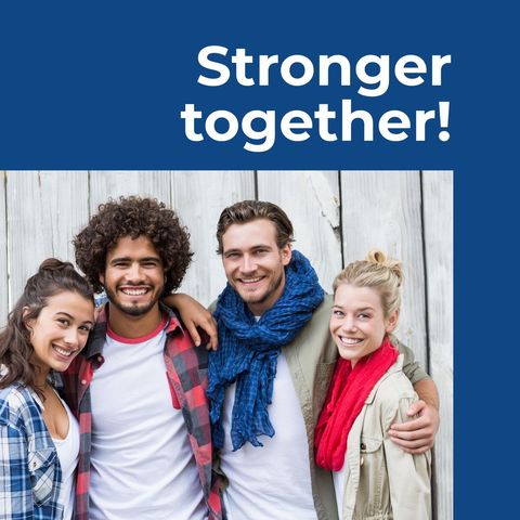 Diverse friends embracing unity with smiles outdoors