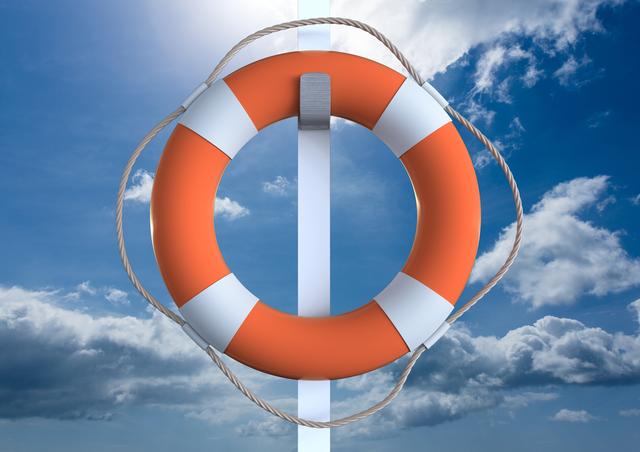 Lifebuoy hanging on a pole against a vibrant sky with clouds, offering a striking visual of maritime safety equipment. Can be used in contexts related to safety measures, emergency protocols, marine and boating activities, or coastal, sea, and beach themes.
