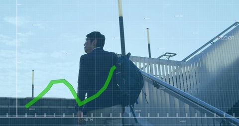 Businessman Surrounded by Digital Financial Data in Urban Background