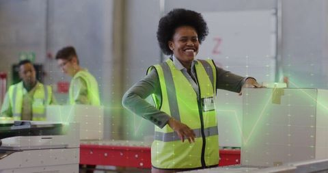 Happy warehouse worker organizing packages on conveyor