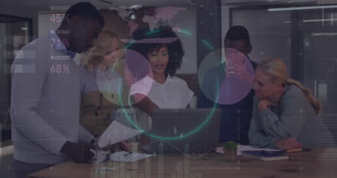 Diverse Business Team Reviewing Financial Analytics in Modern Office