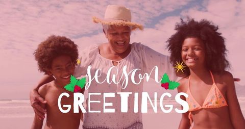 Joyful Family Gathering on Sandy Beach with Seasonal Greetings