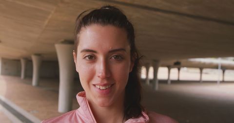 Smiling Biracial Woman in Architectural Outdoor Setting - Download Free Stock Images Pikwizard.com