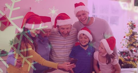 Happy Family Celebrating Christmas with Santa Hats and a Selfie