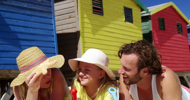 Family Enjoying Summer Vacation at Colorful Beach Houses - Download Free Stock Images Pikwizard.com
