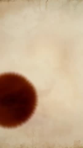 Fuzzy brown circle entering from left across aged parchment background vertical clip