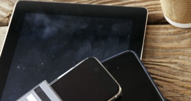 Mobile Devices on Wooden Table with Coffee Cup - Download Free Stock Images Pikwizard.com