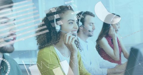 Diverse call center team engaging with clients amid digital data display