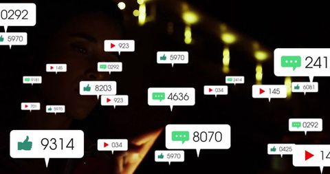 Social Media Engagement Icons Illuminating in Dim Environment