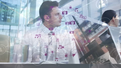 Businessmen Analyzing Digital Networks with Futuristic Graphics