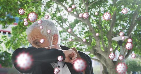 Senior Man Coughing with COVID-19 Cells Overlay Concept