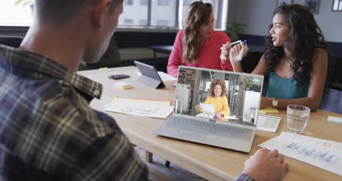 Virtual Meeting Collaborating in Modern Office Setting