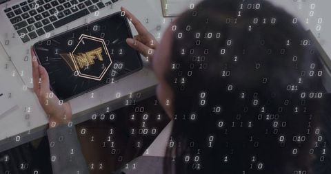 Businesswoman Analyzing NFT Graphic on Tablet in Modern Home Office