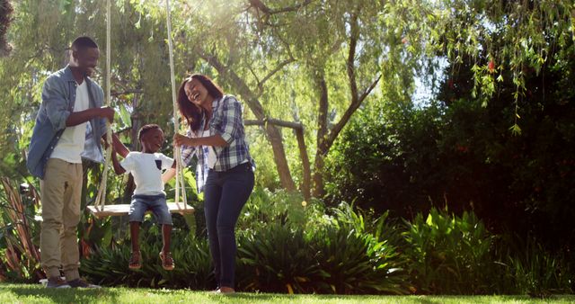 Happy African American Family Enjoying Outdoor Swing - Download Free Stock Images Pikwizard.com