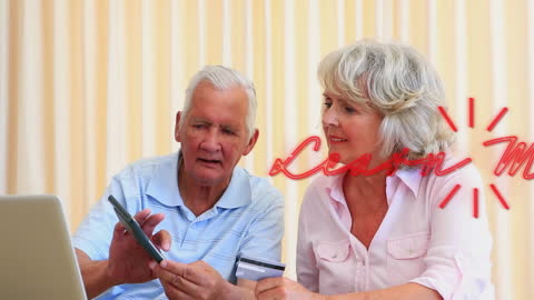 Senior Couple Engaging with Digital Technology at Home