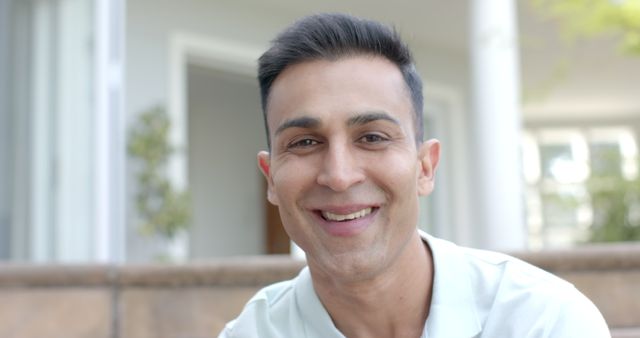 Smiling Man Posing Outdoors in Casual Shirt - Download Free Stock Images Pikwizard.com