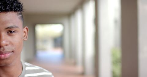 Teenager Deep in Thought in High School Hallway