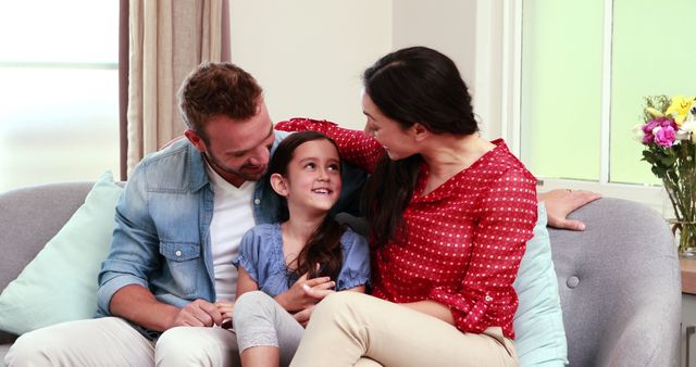 Loving Family Sitting on Couch Together at Home - Download Free Stock Images Pikwizard.com