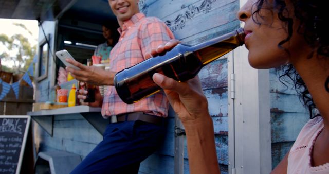 Friends Enjoying Drinks at Outdoor Food Truck - Download Free Stock Images Pikwizard.com