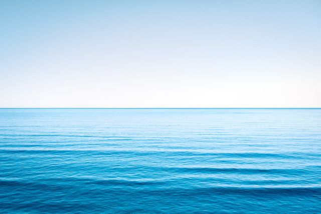 Serene Blue Ocean Horizon With Clear Sky - Download Free Stock Photos Pikwizard.com