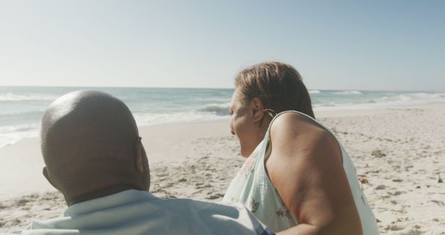 Senior Couple Relaxing on Beach Enjoying Ocean View - Download Free Stock Images Pikwizard.com