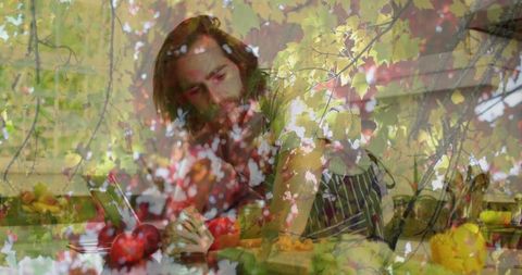 Bearded Chef Slicing Apple Among Vibrant Fall Foliage