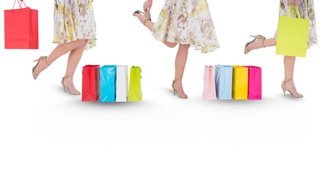 The image showcases a woman wearing heels and a floral dress, carrying bright shopping bags. This cheerful scene captures the excitement and satisfaction of shopping. Ideal for advertisements related to retail, fashion, and promotions, conveying an energetic and joyful shopping experience.