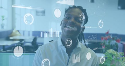 African American Businesswoman Analyzing Digital Financial Data in Office