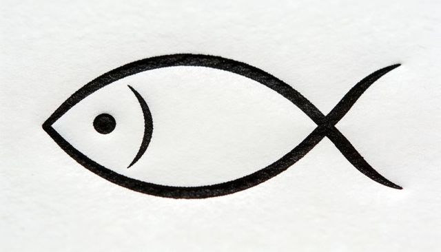 Minimalist ichthys fish symbol ink drawing on white textured paper for faith branding