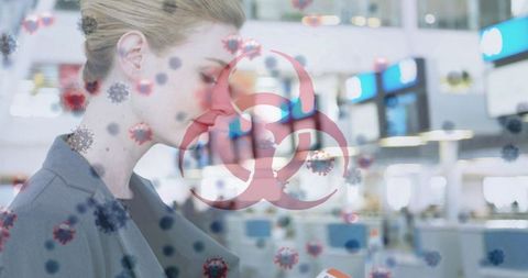 Woman with biohazard symbol overlay representing pandemic awareness
