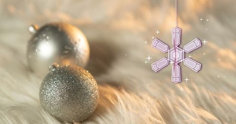 Festive christmas ornaments on fluffy white background