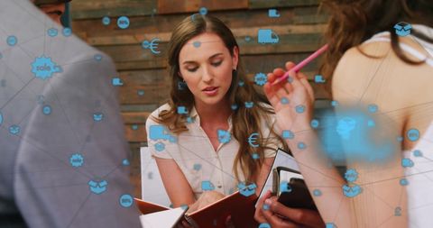 Team Collaborates on Strategic Planning with Integrated Icons